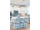 Charming kitchen island with barstool seating, pendant lighting, and a stylish backsplash at 8143 Warford Little Rd, Denver, NC 28037