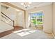 Open-concept living room with entryway and stairs to the second level at 9618 Springholm Dr, Charlotte, NC 28278
