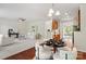 Open-concept living space with stylish furnishings, hardwood floors, and ample natural light at 9618 Springholm Dr, Charlotte, NC 28278