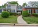 Charming townhome with manicured front yard, lush landscaping, and inviting walkway at 10805 Winterbourne Ct, Charlotte, NC 28277