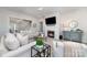 Comfortable living room showcasing a fireplace, modern decor, and plenty of seating for guests at 109 Crossvine Dr, Mooresville, NC 28117
