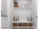 This mudroom offers built-in storage and seating, plus a decorative shelf at 109 Crossvine Dr, Mooresville, NC 28117