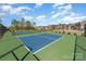 Enjoy the community's outdoor pickleball court with lovely views of neighborhood homes and lush landscaping at 109 Crossvine Dr, Mooresville, NC 28117