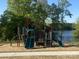 Community playground equipment featuring slides and a climbing area at 109 Crossvine Dr, Mooresville, NC 28117