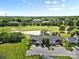 Drone shot of townhomes overlooking pond and golf course at 10942 Winterbourne Ct, Charlotte, NC 28277
