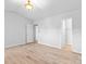 Large bedroom with wood floors and multiple doors for easy access at 10942 Winterbourne Ct, Charlotte, NC 28277
