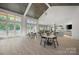 Bright dining area with community kitchen and view of the pool area at 1107 Meander Ln, Waxhaw, NC 28173