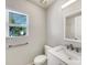 Bathroom with a white vanity, a new toilet, a towel rack and a new mirror at 1107 Stonehenge Ln, Charlotte, NC 28216