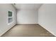 Bedroom with carpet and a bright window at 1107 Stonehenge Ln, Charlotte, NC 28216