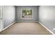 Bedroom with carpet and a bright window at 1107 Stonehenge Ln, Charlotte, NC 28216