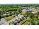 A distant aerial view shows proximity to businesses, homes, and a neighborhood setting at 126 Newsome Rd, Salisbury, NC 28146
