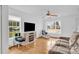 Open living area with large windows, neutral paint, and wood floors; perfect for relaxing or entertaining guests at 126 Newsome Rd, Salisbury, NC 28146