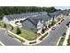 Aerial view of newly constructed gray townhomes in a planned community at 134 Berkeley Ave, Mooresville, NC 28117
