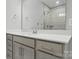 Bathroom features large mirror, vanity with storage, and glass shower at 134 Berkeley Ave, Mooresville, NC 28117