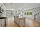 Bright, modern kitchen with a large island, stainless steel appliances, and plenty of natural light at 134 Berkeley Ave, Mooresville, NC 28117