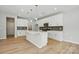 Stylish kitchen features a large island, stainless steel appliances, and modern lighting fixtures at 134 Berkeley Ave, Mooresville, NC 28117