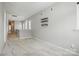 Upstairs loft features carpet, natural light, and neutral paint at 134 Berkeley Ave, Mooresville, NC 28117