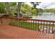 Cozy back deck for relaxing and enjoying the serene lake views and surrounding nature at 139 Sanford Ln, Badin Lake, NC 28127