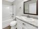 Functional bathroom featuring a tub-shower combo and a vanity with ample counter space at 1399 Foxbrook Cir, Lancaster, SC 29720