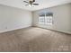 Bright bedroom with neutral carpet, a ceiling fan and natural light at 1399 Foxbrook Cir, Lancaster, SC 29720