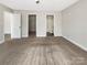 Spacious bedroom with plush carpet, white walls, and access to closet and bathroom at 1399 Foxbrook Cir, Lancaster, SC 29720