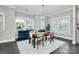 Inviting dining room with a modern chandelier and ample natural light at 1412 W 4Th St, Charlotte, NC 28208