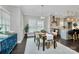 Bright dining area with modern furniture and large windows at 1412 W 4Th St, Charlotte, NC 28208
