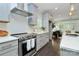 Modern kitchen with stainless steel appliances and plenty of counter space at 1412 W 4Th St, Charlotte, NC 28208
