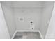 Clean and functional laundry room with utility connections and ample space at 1412 W 4Th St, Charlotte, NC 28208