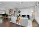 Sun-filled living area with hardwood floors, stylish seating, and a seamless flow to the kitchen at 1412 W 4Th St, Charlotte, NC 28208