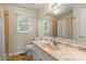 Neutral bathroom with marble-look countertop and a shower and tub combination at 1504 Andicot Ln, Shelby, NC 28152