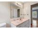 Neutral bathroom with marble-look countertop and a large mirror at 1504 Andicot Ln, Shelby, NC 28152
