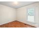 Bright bedroom featuring hardwood floors and a window that allows in natural light at 1504 Andicot Ln, Shelby, NC 28152