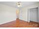 Spacious bedroom featuring hardwood floors, closet, and a ceiling fan at 1504 Andicot Ln, Shelby, NC 28152