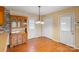 Warm dining area featuring traditional wooden cabinetry and a convenient double door closet at 1504 Andicot Ln, Shelby, NC 28152