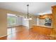 Open floor plan connecting the living room to the kitchen, creating a spacious and inviting atmosphere at 1504 Andicot Ln, Shelby, NC 28152