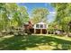 Expansive backyard featuring lush greenery and a well-maintained lawn at 1565 Oakridge Dr, Salisbury, NC 28146
