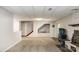 Finished basement featuring neutral paint, plush carpet, recessed lighting, and access to an unfinished room at 1565 Oakridge Dr, Salisbury, NC 28146