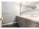 This bathroom features a large mirror and double vanity providing an abundance of counter space at 1565 Oakridge Dr, Salisbury, NC 28146