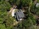 Bird's eye view of home with a black shingle roof surrounded by trees at 16518 Here At Last Ln, Charlotte, NC 28278