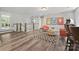 This bonus room features hardwood floors, bar seating, and is perfect for entertaining at 16518 Here At Last Ln, Charlotte, NC 28278