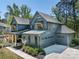 Stunning two-story home with three-car garage and a charming front porch at 16518 Here At Last Ln, Charlotte, NC 28278