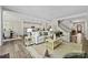 Bright and spacious living room with an open layout, seamlessly connected to the modern kitchen and dining area at 16518 Here At Last Ln, Charlotte, NC 28278
