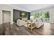 Bright living room with a view into a patio area at 16518 Here At Last Ln, Charlotte, NC 28278