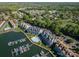 Aerial view of community on the water with pool, docks and beautiful landscaping at 18723 Vineyard Point Ln, Cornelius, NC 28031