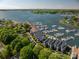 Beautiful aerial view of the waterfront community with docks and beautiful landscaping at 18723 Vineyard Point Ln, Cornelius, NC 28031
