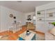Open-concept living space featuring dining area and kitchen in the background at 216 Wakefield Dr # B, Charlotte, NC 28209
