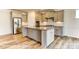 Spacious kitchen features stainless steel appliances, island, and light wood flooring at 2237 Tabor Rd # 585, Sherrills Ford, NC 28673