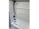 Updated bathroom with a white tiled shower-tub combination and modern black fixtures at 240 North Ave, Troutman, NC 28166