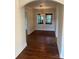 Charming dining room featuring hardwood floors and a decorative light fixture at 240 North Ave, Troutman, NC 28166